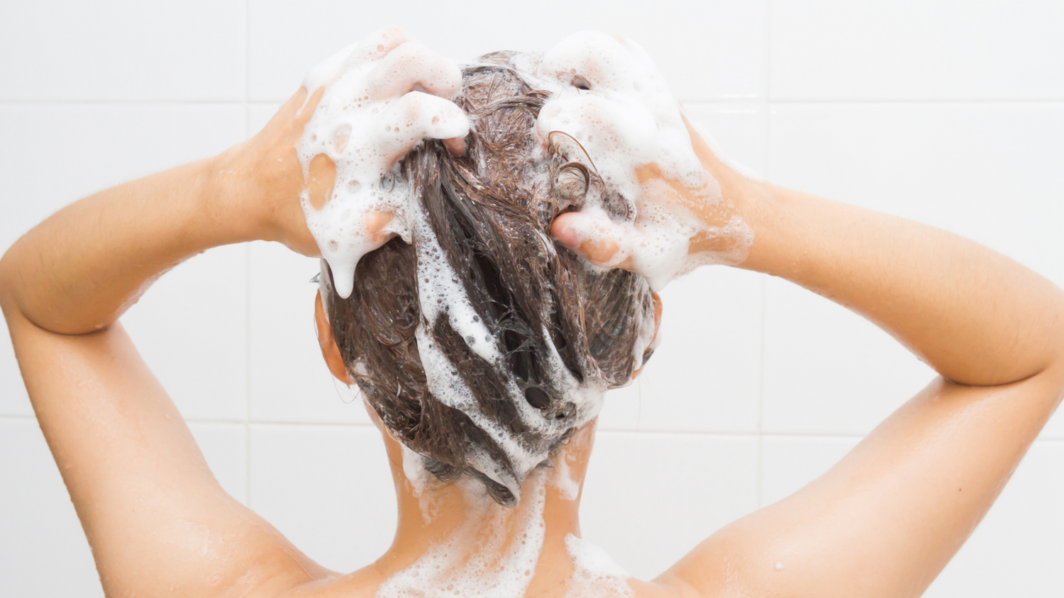 plantur 39 are sulfates bad for your hair woman in shower washing hair